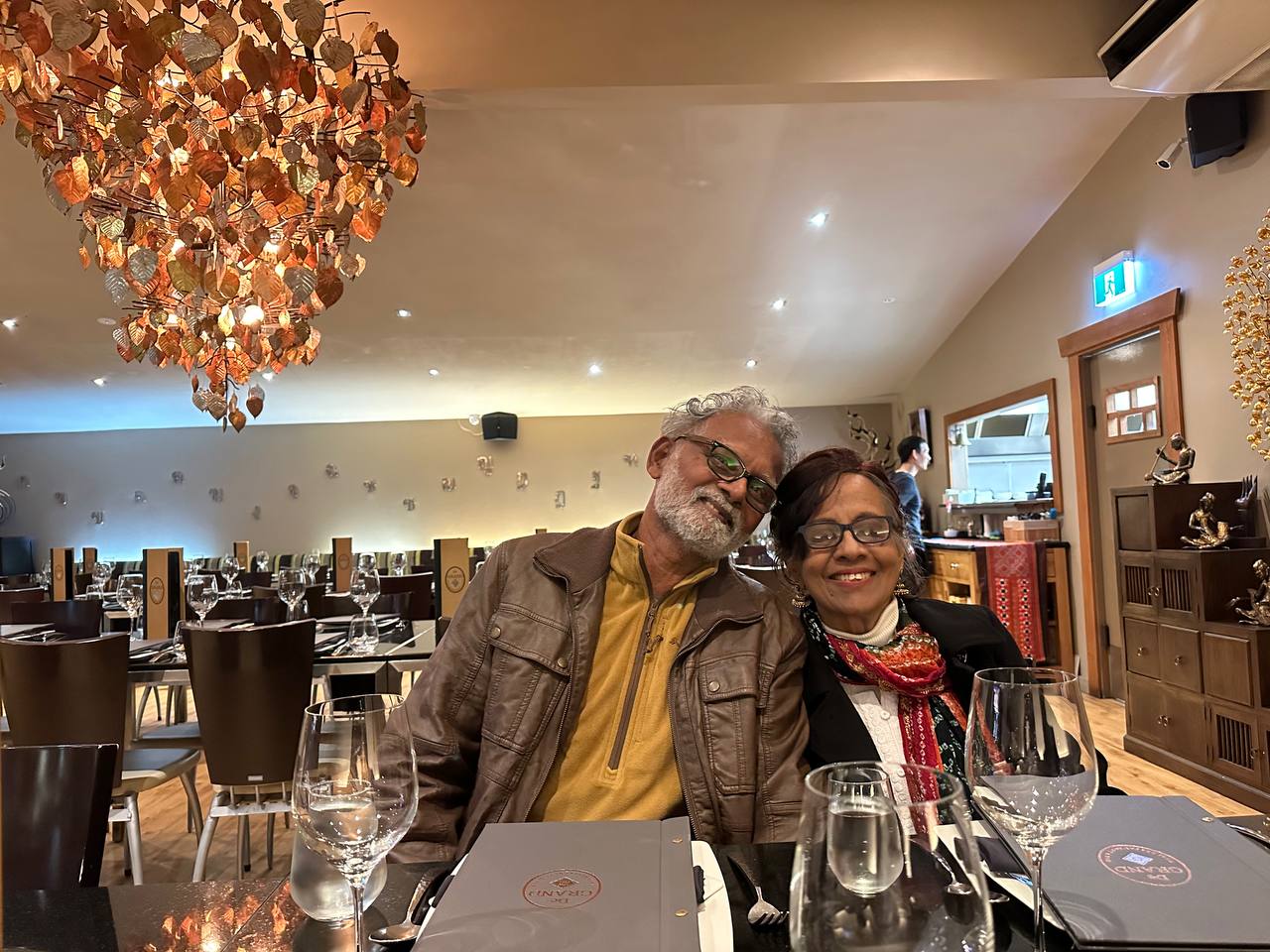 DK & Maya at a restaurant